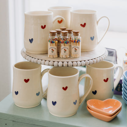 Carved Rainbow Heart Mugs from Linko Pottery