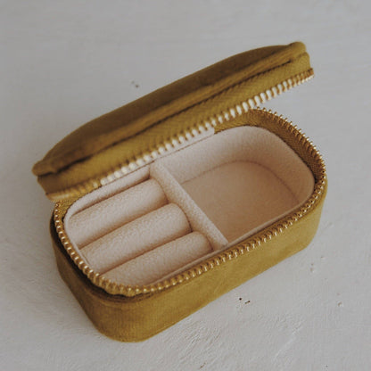 Chartreuse jewelry box with a ring on a white background